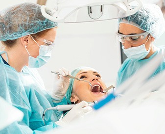 Patient undergoing dental implant surgery