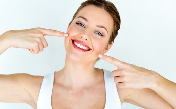 Woman in Fresno smiling after teeth whitening