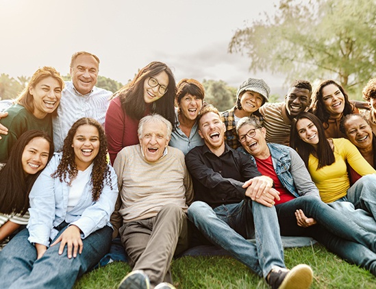 Group of people in Fresno smiling after teeth whitening